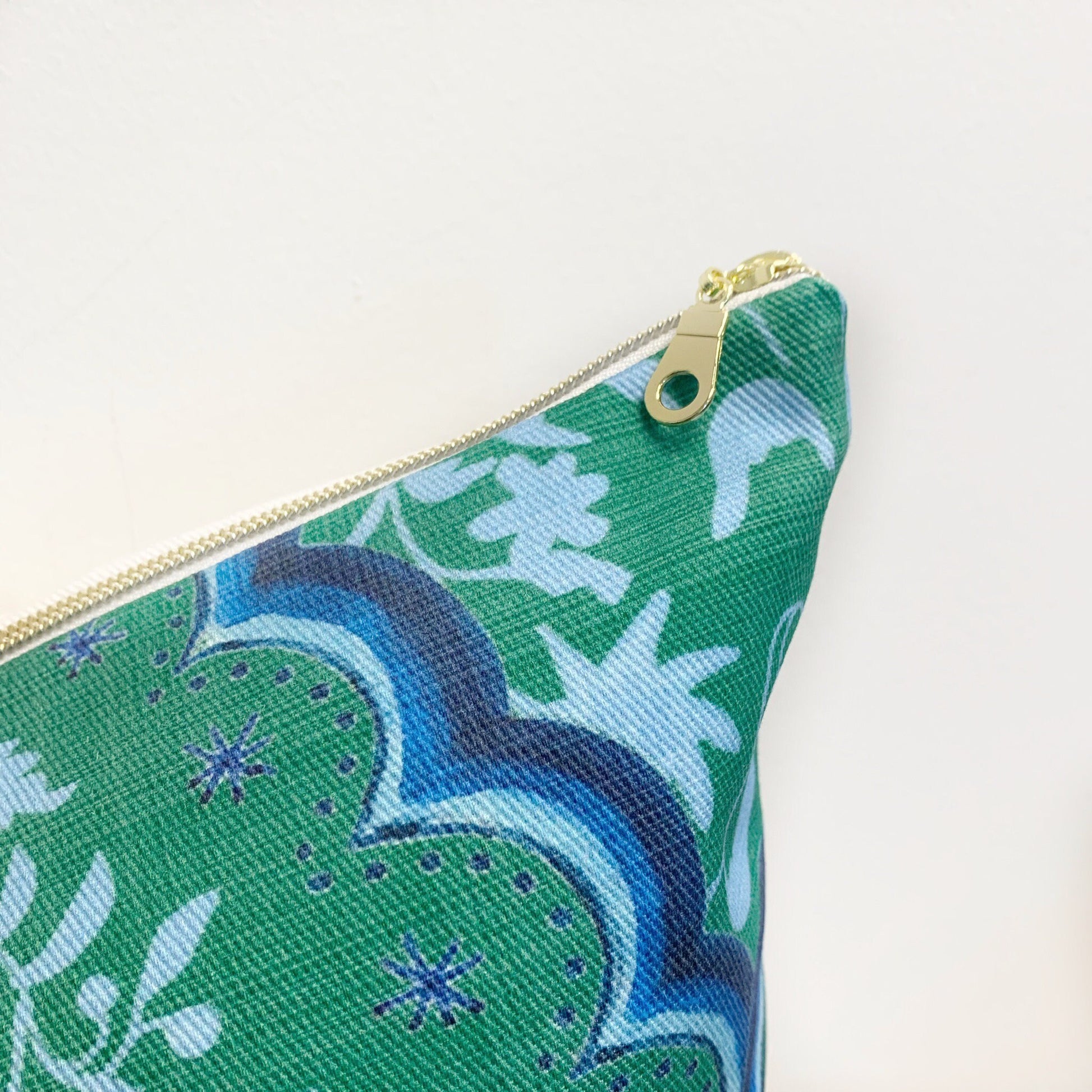 Designer Curated : Little Beasties + Scallop Paisley blue and green throw pillows by Danika Herrick